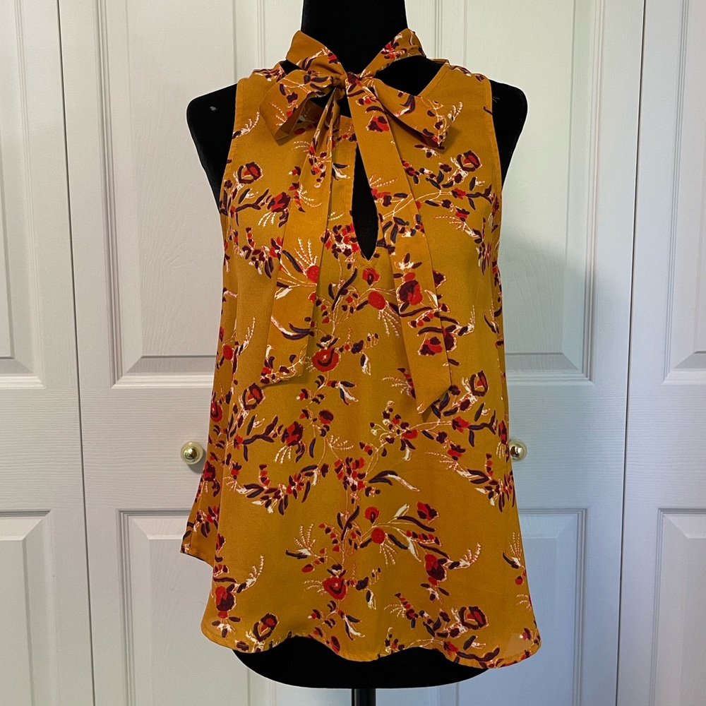 ASTR | Mustard Yellow Floral Top with Peak-A-Boo Back and Bow at Collar